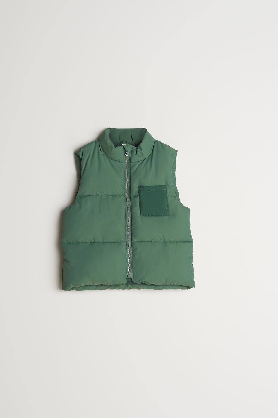 green puffer vest