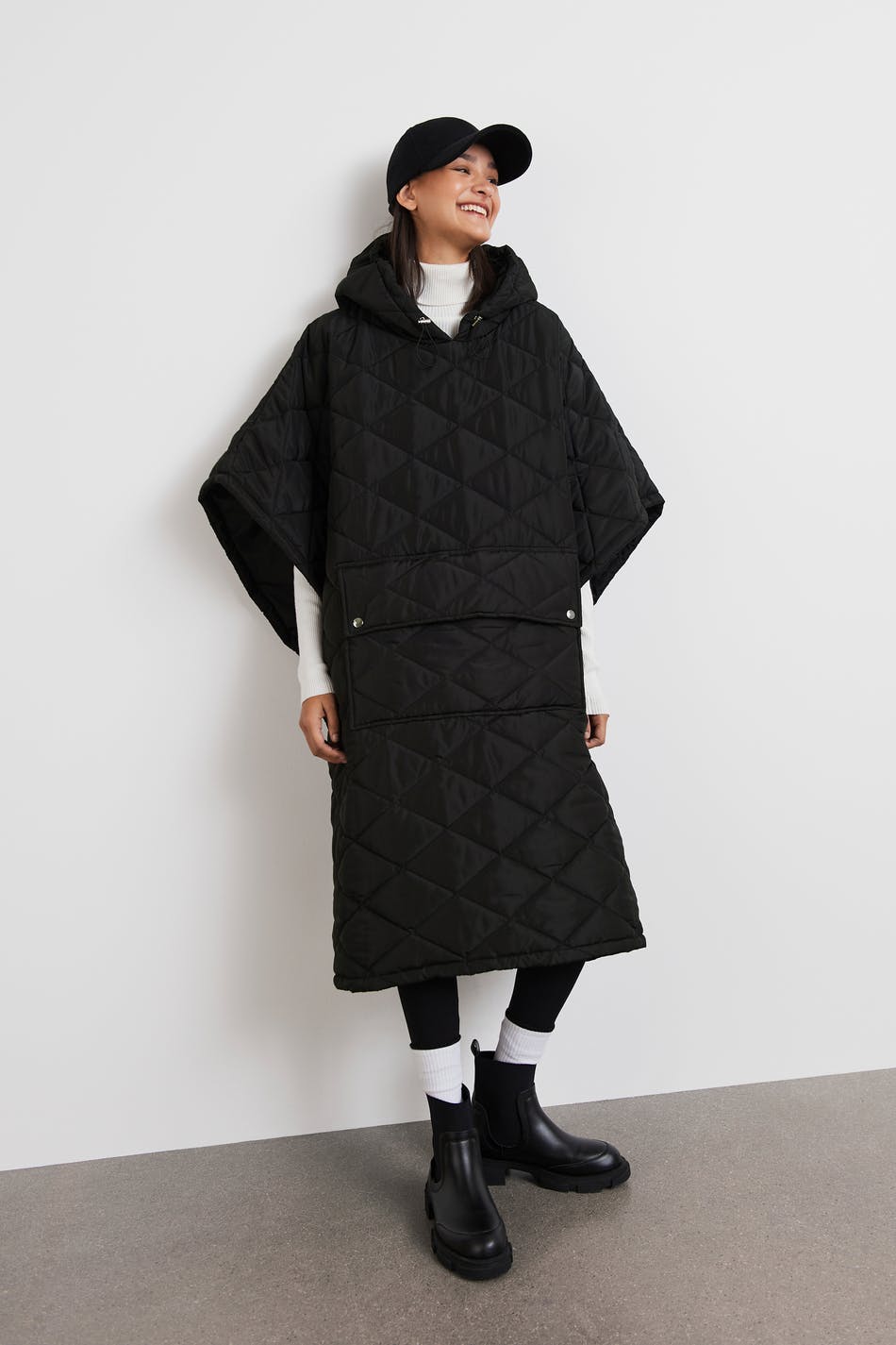 varm Fremkald Pointer Bea quilted cape - Gina Tricot
