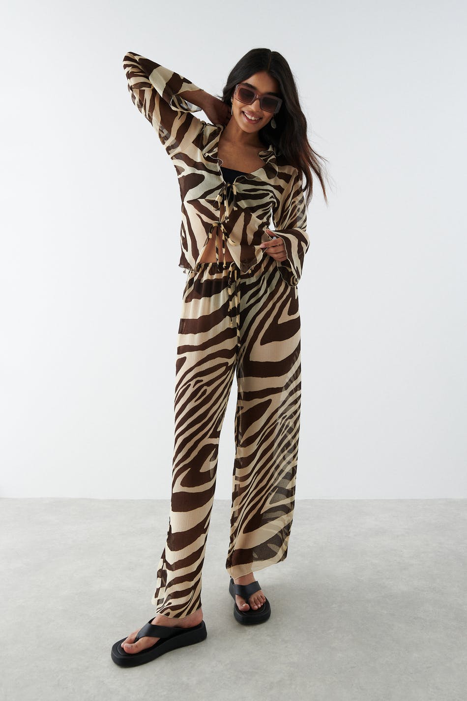 Gennemvæd Kiks Gepard Mønstrede bukser - Beklædning og mode online - Gina Tricot