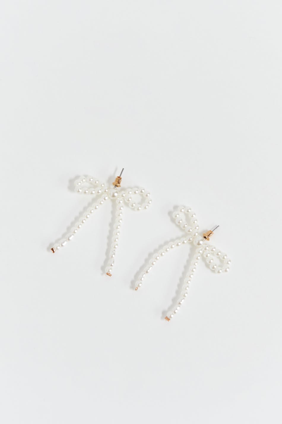 Pearl bow earrings - White - Women - Gina Tricot